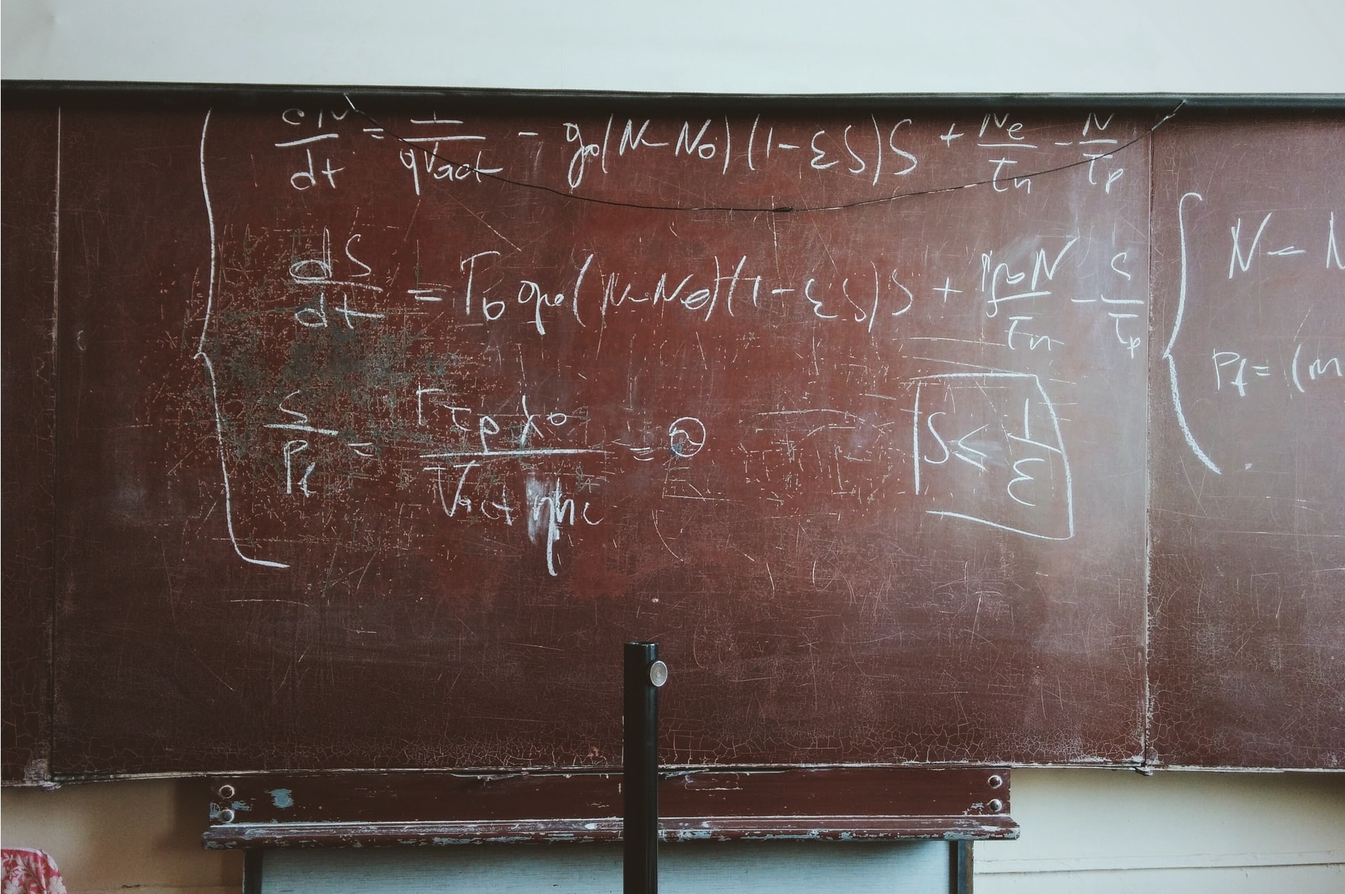 Math written on chalkboard.